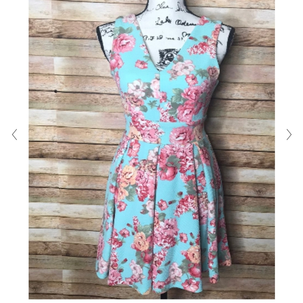 Fit and flare turquoise dress with flowers